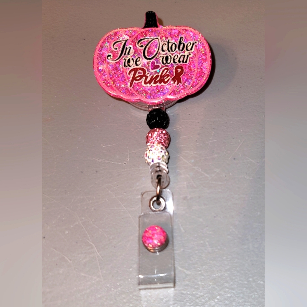 Breast cancer pumpkin badge reel